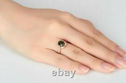 2.10Ct Oval Cut Green Emerald Flower Halo Engagement Ring 14K Rose Gold Finish