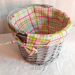 Cute decorative basket lined gray with pink green & blue inside