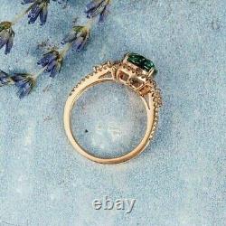 Lab-Created Emerald 2.50 Ct Oval Cut Halo Engagement Ring 14k Rose Gold Plated