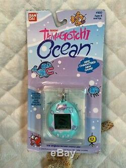 RARE 1997 Bandai Tamagotchi Ocean- Sea Foam Green With Pink Fish New In Package